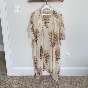 Cream colored floral sheer kimono.